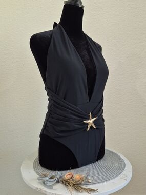 Deep V-Neck Black One-Piece Swimsuit with Gold Star Accent
